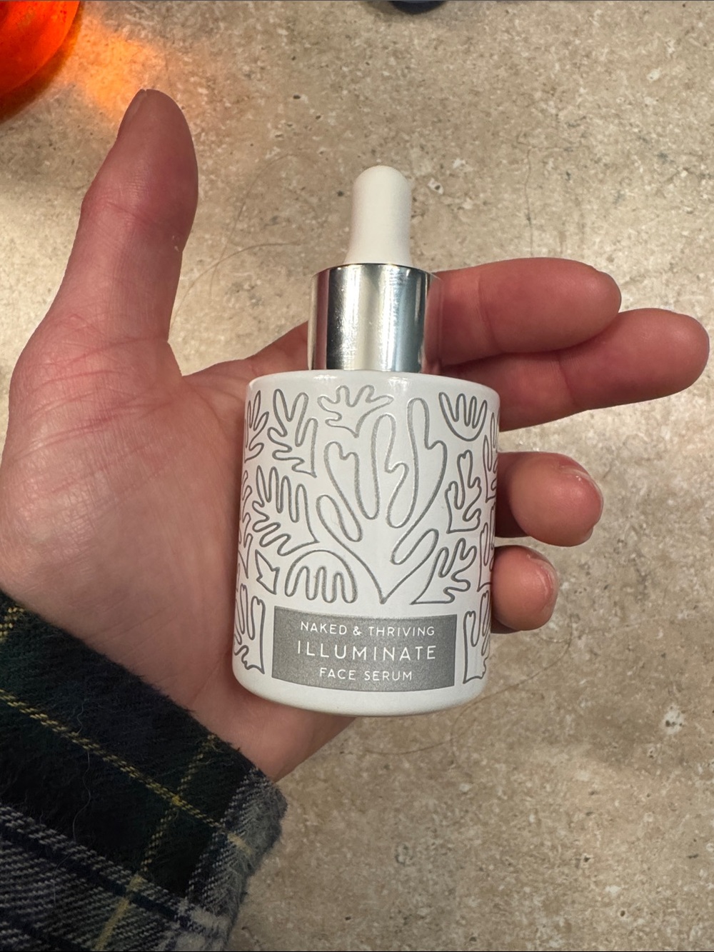 Naked and thriving illuminate serum